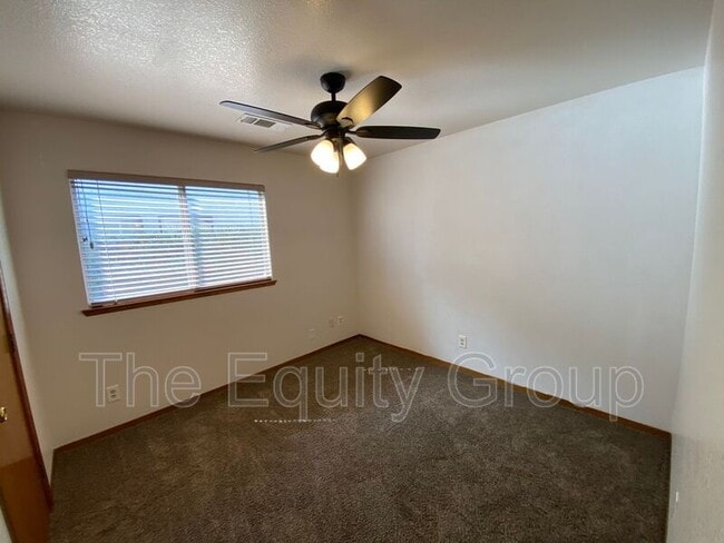 Building Photo - 5817 W Crowley Ave