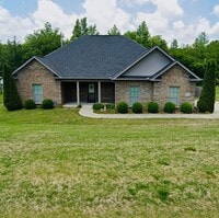 Building Photo - Custom Built Home with Fenced Yard