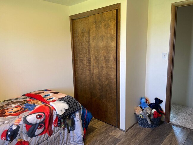 Building Photo - Spacious, four-bedroom, two-bathroom, coun...