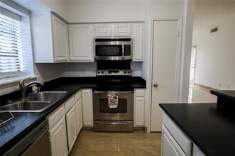 Building Photo - 5859 Frankford Rd