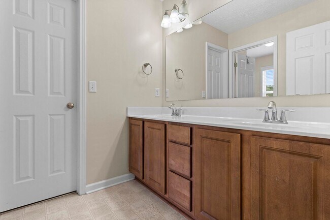 Building Photo - House with Fenced Back Yard Available!