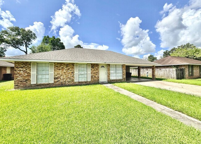 Building Photo - Bright & Spacious 3 Bedroom Brick Home with Double Carport & Large Backyard