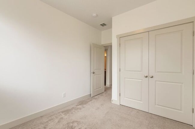 Building Photo - Modern End Unit townhouse w attached 2 car...