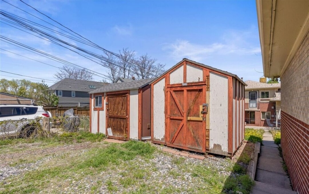 Assigned parking spot and storage shed for additional storage - 5014 W 36th Ave