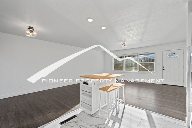 Building Photo - Stylishly Renovated Home with Enclosed Fence, AC and 1 Car Garage