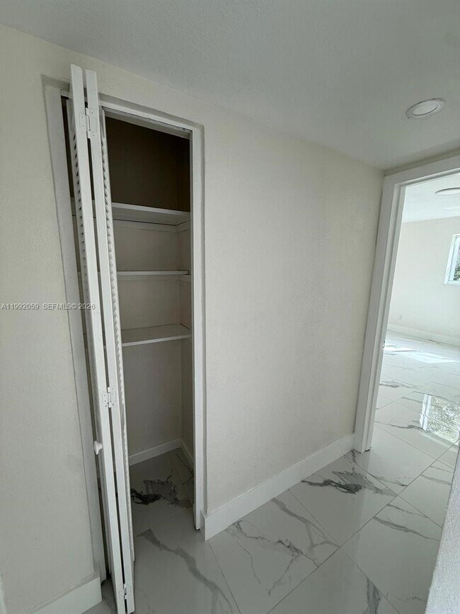 Building Photo - 4298 NW S Tamiami Canal Dr