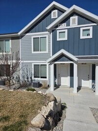 Building Photo - Nearly New, Well Appointed Modern Townhouse w 2 car attached garage