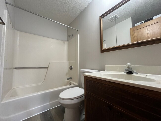 Building Photo - Spacious 2-Bed, 1-Bath Townhome with a Gar...