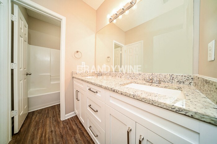 Building Photo - 6366 Wellesley Dr