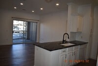 Building Photo - Beautiful Ground Floor Condo in Falling Water Condominiums!!
