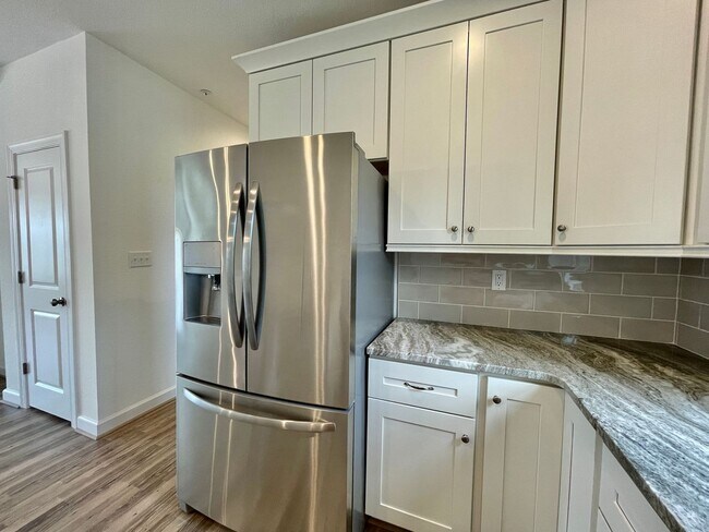 Building Photo - Practically New & Available NOW! Americana...