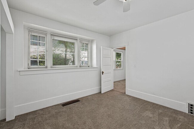 Building Photo - 8 Bedroom Home with 3 Kitchens Near UNC - Available as a single home or 2 separate units.