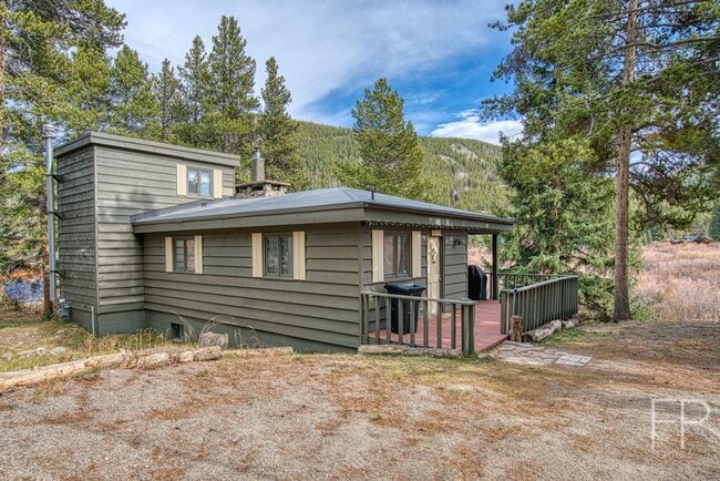 Building Photo - On the Blue River!  HUGE 4 Bedroom home, Furnished Updates throughout!  Bus route!  Spacious parking