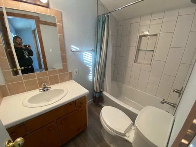 Building Photo - Year Lease 3 bedroom unit with Carport and...
