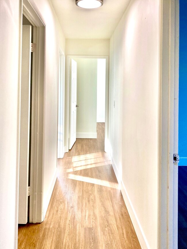 wood stair lead to up. stair hall way - 2456 Arizona Ave