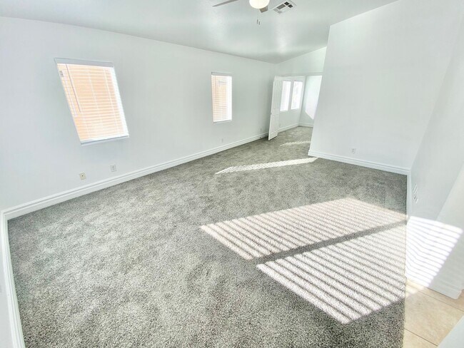 Building Photo - STUNNING 2 STORY HOME IN A GUARD GATED COM...
