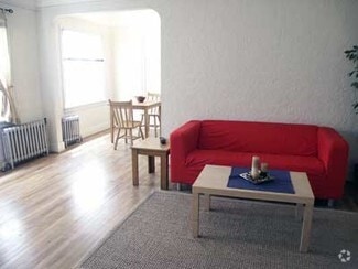 LIVING ROOM - Adelle Apartments