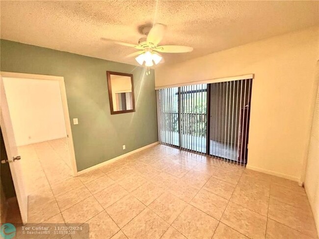 Building Photo - 2500 Coral Springs Dr