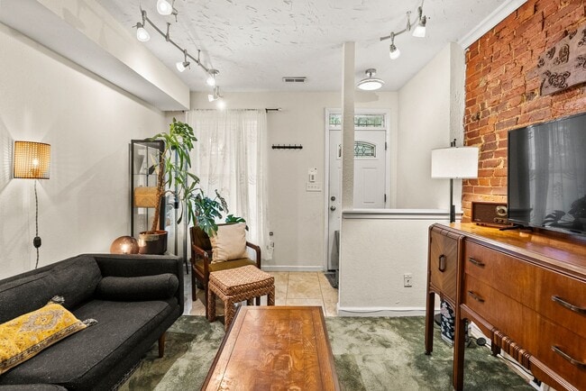 Building Photo - Charming Row Home | 2 Bed | 1 Bath | 950 Sf | Fenced Backyard | 2 Surface Parking Spaces