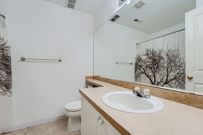 Building Photo - Ideally Located 3 Bed 3.5 Bath w/ Attached...