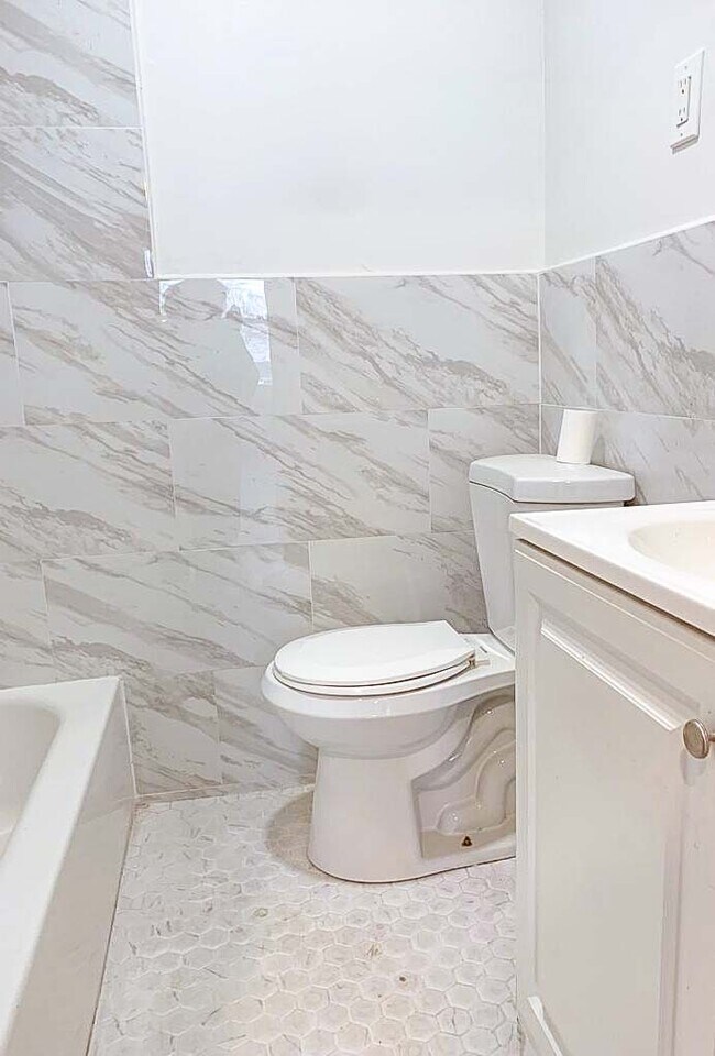 Building Photo - 92-20-20 50th Ave