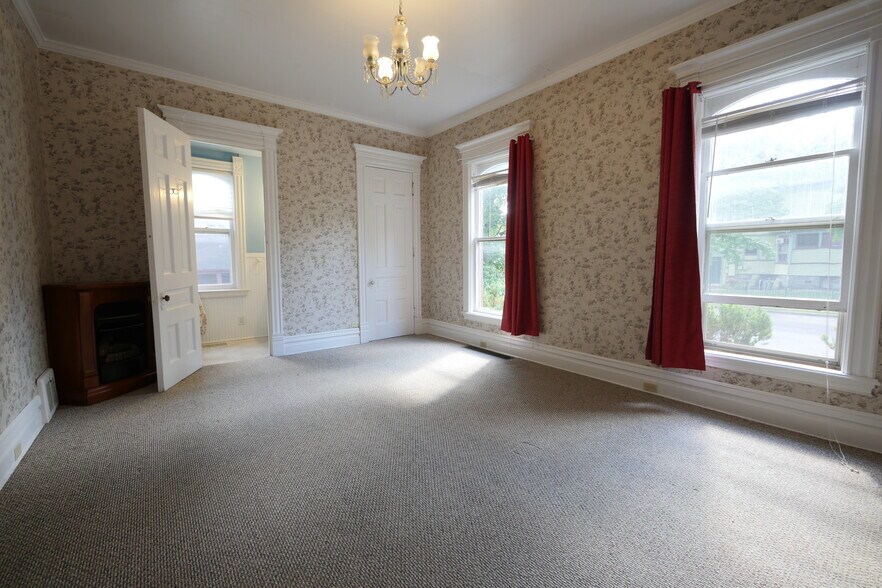First bedroom full private restroom southwest view - 617 W South St