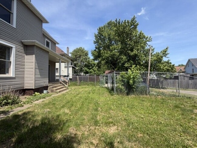 Building Photo - Spacious 4-Bedroom Home with 2 Full Baths, Central A/C & Fenced Yard!