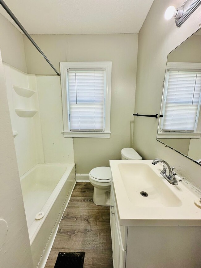 Building Photo - Updated two story home with unfinished bas...