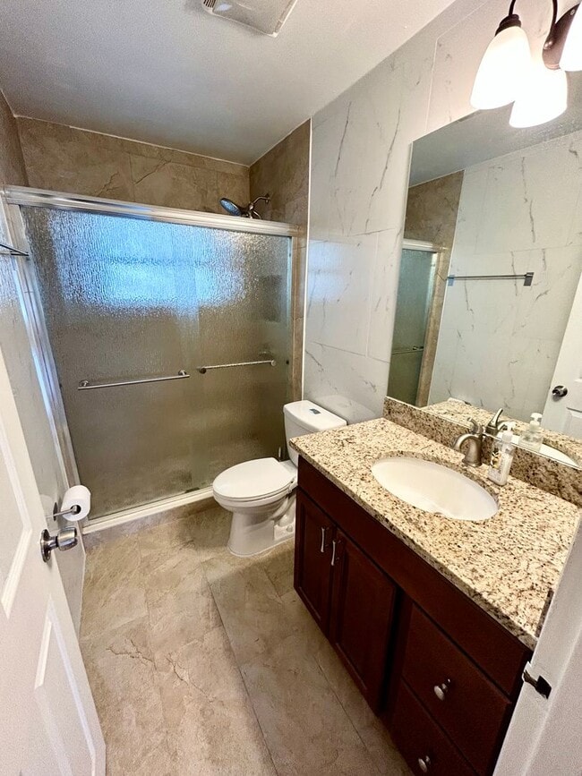 Building Photo - Gorgeous updated 2-bedroom 2-bath home with garage and fenced in backyard