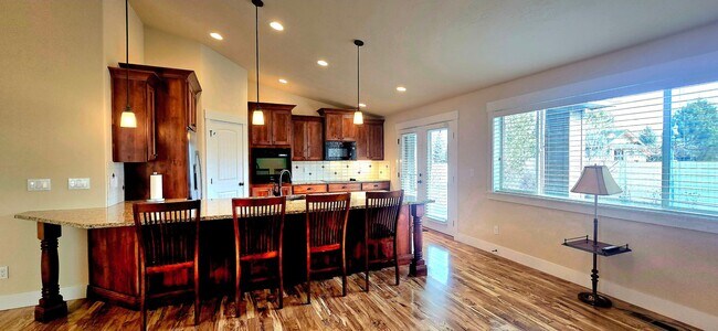 Building Photo - THREE-CAR GARAGE! This charming home offers 3 bedrooms, plus an office/rec room, and 2 bathrooms.