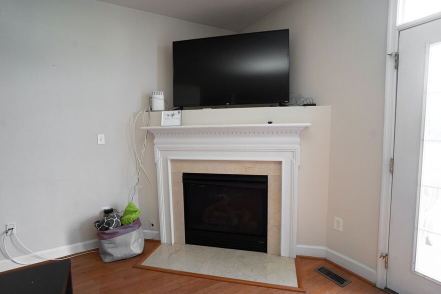 TV Room Fireplace - 604 Kingfisher Ave