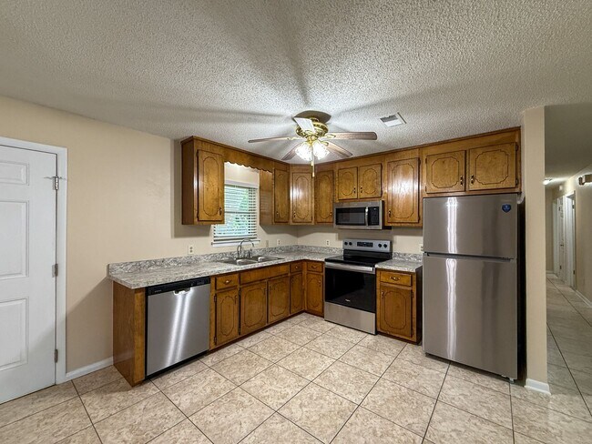 Building Photo - Completely Updated Brick Home with New Kitchen Appliances, Bathrooms, Flooring & Paint!