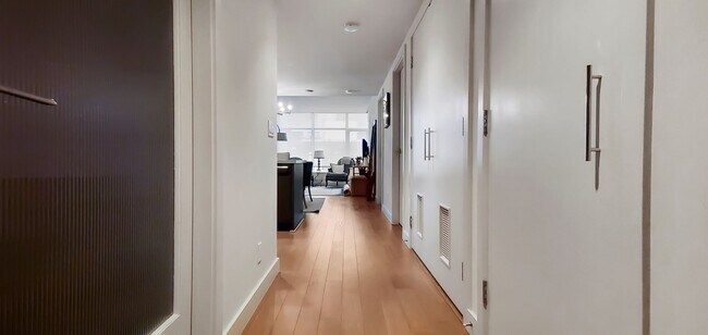 Building Photo - One of kind 7th terrace unit in reputable ...