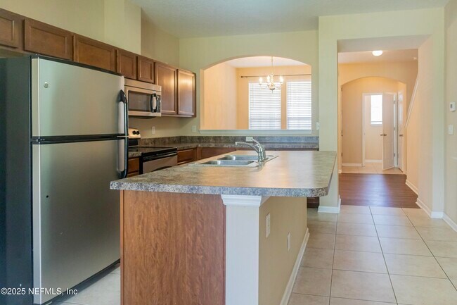 Building Photo - 4220 Plantation Oaks Blvd