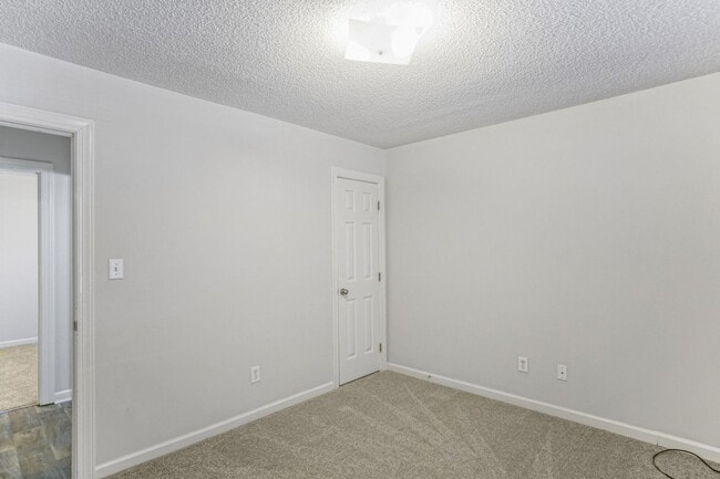 Building Photo - 3418 Pear Tree Court Unit B