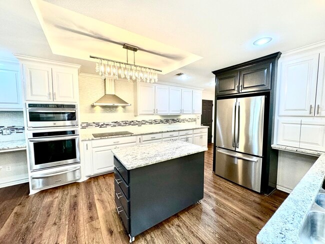 Building Photo - 9306 Utica Dr