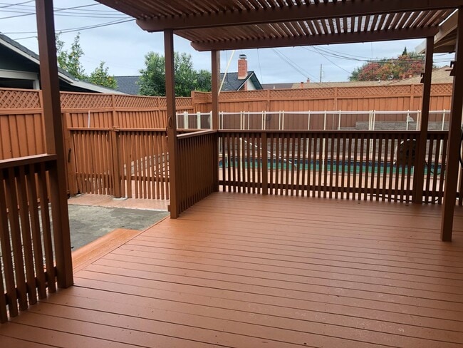 Building Photo - 4bd/2ba - Bedroom Home with a Lap Pool! Excellent Location - Coming Soon!