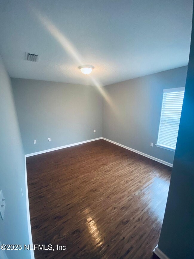 Building Photo - 8465 McGirts Village Ln