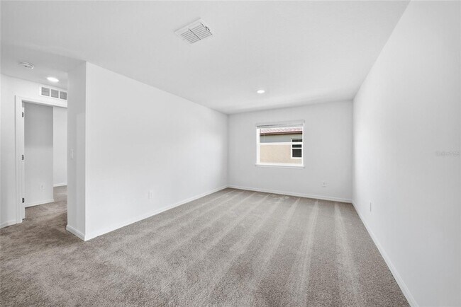 Building Photo - 8879 Coqui Song Ln