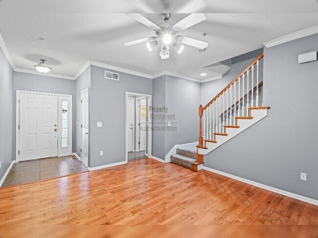 Building Photo - "Charming Lenexa Townhouse: Spacious 2-Bed Retreat with Finished Basement & Gleaming Hardwood Flo...