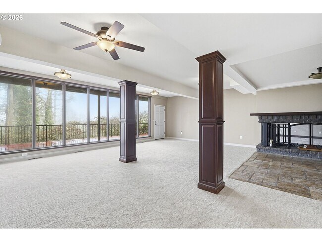 Building Photo - One-of-a-Kind 5BR Home with Floor-to-Ceiling Windows, Wraparound Decks & Breathtaking Treeline Views