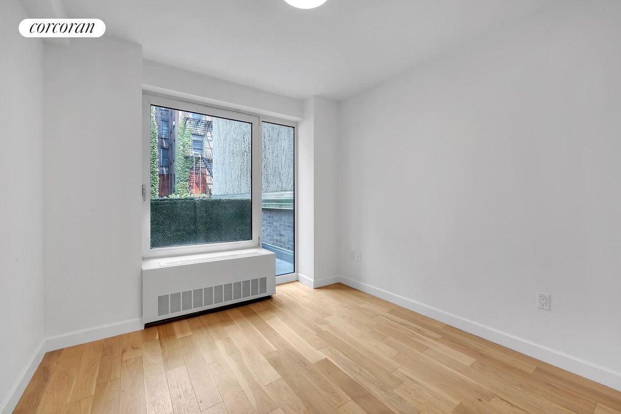 Building Photo - 111 E 115th St