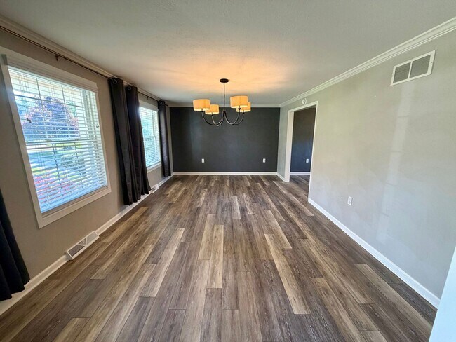 Building Photo - Modern Comforts Await: Spacious Rental with 2-Car Garage, Private Office, and Finished Basement w...