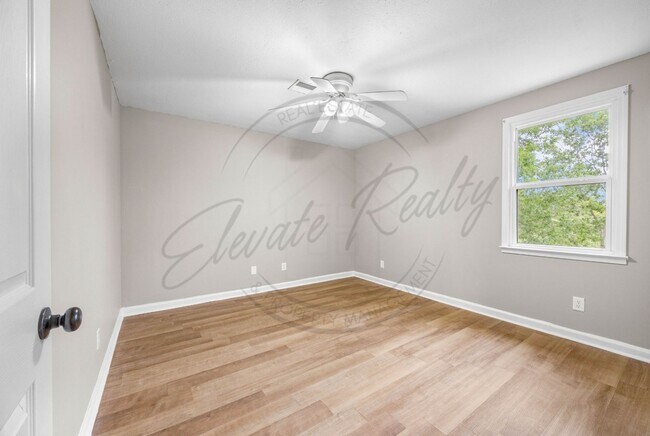 Building Photo - Four Bedroom Two Story with Two Car Garage...