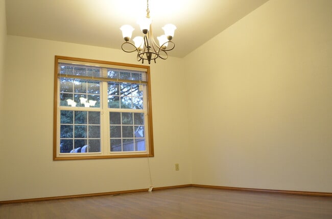 Building Photo - Private Summer Ridge Retreat with Vaulted Ceilings & Fenced Backyard