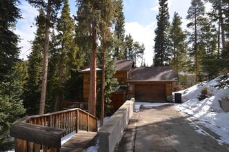 Building Photo - In the woods! Garage and pets negotiable!