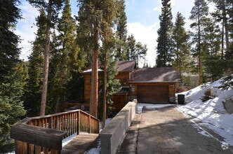 Building Photo - In the woods! Garage and pets negotiable!
