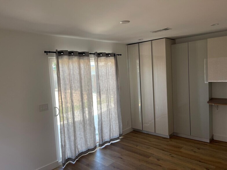 Building Photo - 7051 Garden Grove Ave