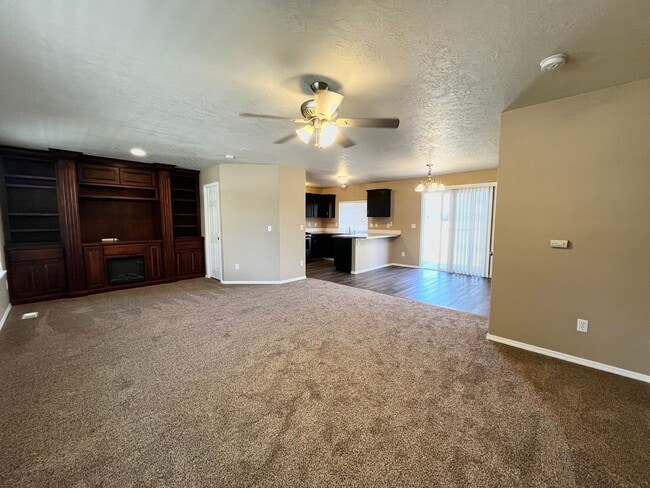Building Photo - 4 Bedroom Home with Bonus Room Potential & RV Parking!