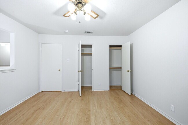 Building Photo - 4 Bedroom home with ZERO carpet close to RAFB